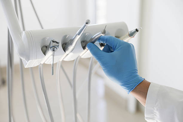 Professional Invisalign Clear Aligners technician working in DeWitt County County, TX